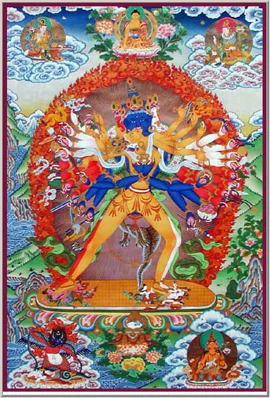 La divinità di Kalachakra (yab-yum) simbolizza l’unione del principio maschile del metodo con quello femminile della saggezza.