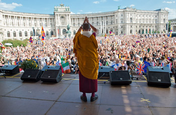 His Holiness the Dalai Lama greeting the crowd of over 10,000 at the European Solidarity Rally for Tibet at the Vienna Heldenplatz in Vienna, Austria, on May 26, 2012. Photo/Tenzin Choejor/OHHDL