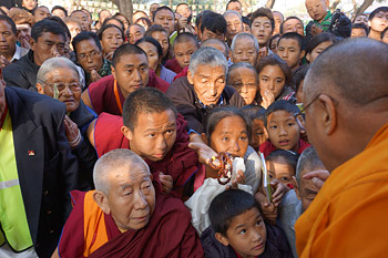 His Holiness the Dalai Lama taking part in the opening prayers on the ninth day of his teachings at Sera Jey Monastery in Bylakuppe, Karnataka, January 2, 2014. Photo/Tenzin Choejor/OHHDL