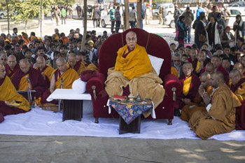 His Holiness the Dalai Lama reciting prayers and praises in front to the stupa in Sankisa, UP, India on January 30, 2015. Photo/Tenzin Choejor/OHHDL