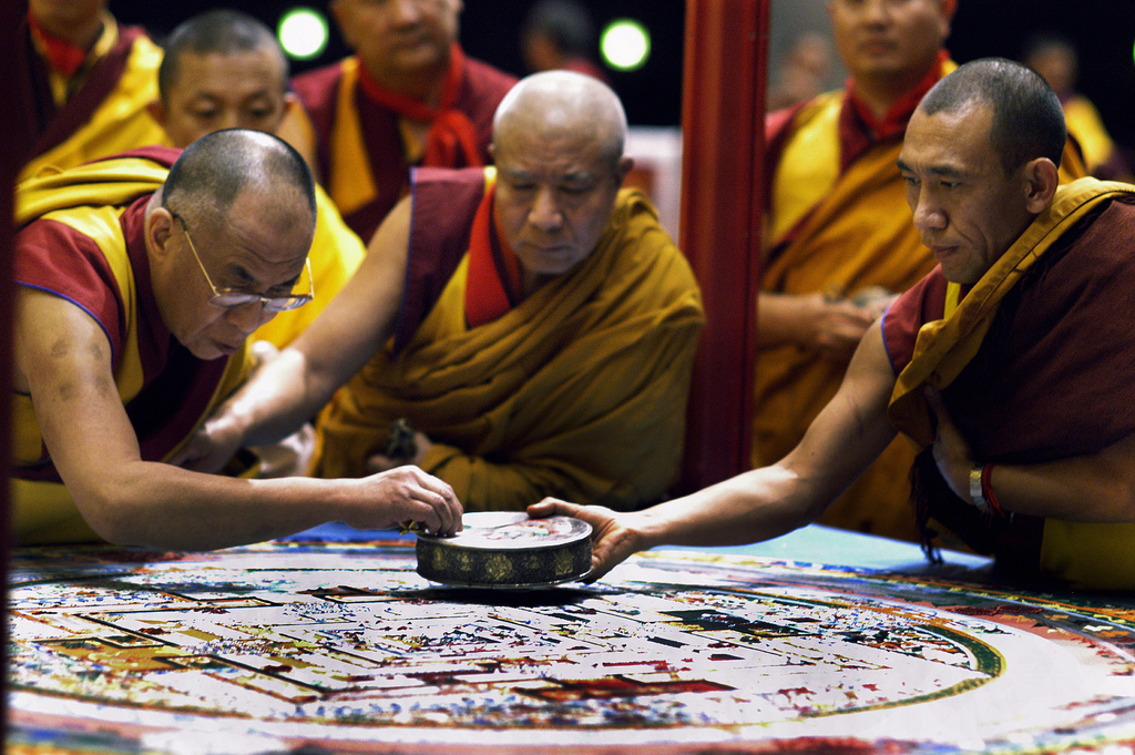 His Holiness the Dalai Lama prepares the Kalachakra mandala.