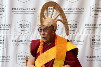 His Holiness the Dalai Lama wearing a traditional ceremonial hat at the Bishop Museum on Oahu, Hawaii, on April 14, 2012. Photo/Brian Tseng/Civic Beat 