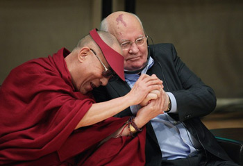 His Holiness the Dalai Lama and former Russian President Mikhail Gorbachev participate in a panel discussion during the 12th World Summit of Nobel Peace Laureates held in Chicago, Illinois, on April 25, 2012. Photo/Getty Images