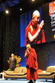 His Holiness the Dalai Lama greeting the audience before his public talk "Cultivating Peace of Mind" in Maribor, Slovenia, on May 16, 2012. Photo/Tenzin Taklha/OHHDL