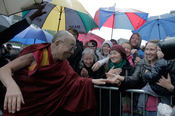 His Holiness the Dalai Lama is greeted by well-wishers on his arrival in Edinburgh, Scotland, on June 21, 2012. 