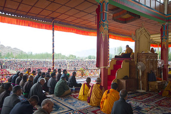 His Holiness the Dalai Lama greeting the audience at the start of his second day of teachings in Leh, Ladakh, J&K, India, on August 5, 2012. Photo/Namgyal AV Archive