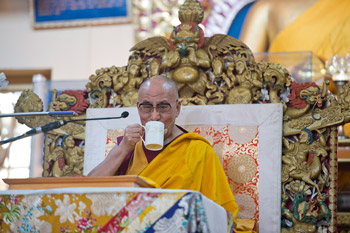 His Holiness the Dalai Lama enjoying a cup of tea during his teachings at the Main Tibetan Temple in Dharamsala, India, on October 2, 2012. Photo/Tenzin Choejor 