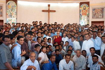 His Holiness the Dalai Lama with students and staff during his visit to the Chapel at Christ University in Bangalore, India, on November 26, 2012. Photo/Jeremy Russell/OHHDL