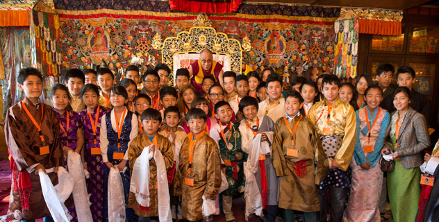 His Holiness the Dalai Lama with some of the young Tibetans who have attended programs at the Tibet Institute in Rikon, Switzerland, on April 17, 2013. Photo/Manuel Bauer