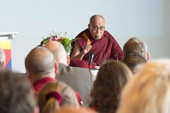 His Holiness the Dalai Lama speaking at the European Tibetan Buddhist Conference held at the Friborg Forum in Friborg, Switzerland, on April 12, 2013. Photo/Manuel Bauer