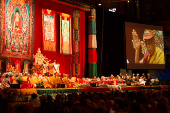 His Holiness the Dalai during the teachings at the Forum Fribourg at Fribourg, Switzerland, on April 14, 2013. Photo/Manuel Bauer
