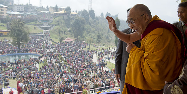 His Holiness the Dalai Lama greeting the crowd