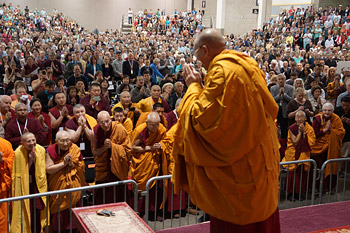 His Holiness the Dalai Lama greeting the audience on his arrival at the Alliant Energy Center in Madison, Wisconsin on May 14, 2013. Photo/Jeremy Russell/OHHDL 