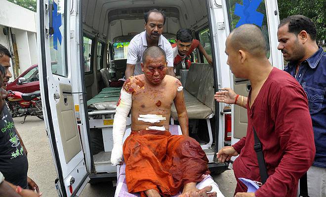 A monk badly injured by the blast in Mahabodhi Bodhgaya