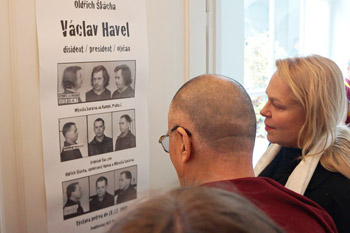 His Holiness and the late President Vaclav Havel's wife Dagmar Havlova looking at a poster depicting Vaclev Havel's arrests in his office in Prague, Czech Republic on September 16, 2013. Photo/Jeremy Russell/OHHDL