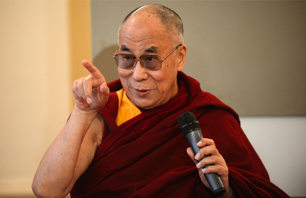 Tibetan spiritual leader, the Dalai Lama gestures during his press conference at the international conference FORUM 2000 in Prague, Czech Republic, on September 17, 2013. The 17th annual Forum 2000 Conference convene global leaders from politics, academia, religion, business and civil society are meeting to discuss key issues facing civilization. The Forum 2000 Foundation was founded in 1996 by Czech President Vaclav Havel, Japanese philanthropist Yohei Sasakawa, and Nobel Peace Prize laureate Elie Wiesel. According to the organization, the main objective of its conferences is ‘to identify the key issues facing civilization and to explore ways to prevent the escalation of conflicts that have religion, culture or ethnicity as their primary components. (EPA Photo)