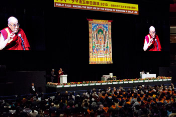 His Holiness the Dalai Lama speaking during his public talk at Ryogoku Kokugikan Hall in Tokyo, Japan on November 25, 2013. Photo/Office of Tibet, Japan