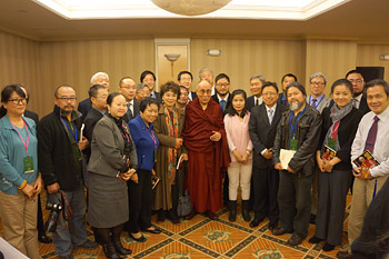 His Holiness the Dalai Lama with a group of Chinese scholars and writers after their meeting in New York on October 21, 2013. Photo/Jeremy Russell/OHHDL