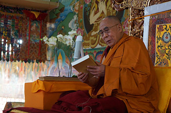 His Holiness the Dalai Lama holding a copy of "Opening the Eye of Discernment" introduced at the start of the fourth day of teachings at Sera Jey Monastery in Bylakuppe, Karnataka, India on December 28, 2013. Photo/Jeremy Russell/OHHDL