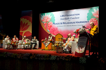His Holiness the Dalai Lama speaking at the Interfaith Conclave on Peace and Religious Harmony in Guwahati, Assam, India on February 1, 2014. Photo/Tenzin Choejor/OHHDL