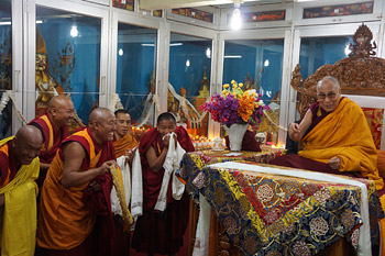 His Holiness the Dalai Lama shares a moment of laughter with the monks at Ganden Choling in Lamparing, Meghalaya, India on February 4, 2014. Photo/Jeremy Russell/OHHDL