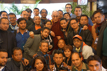 His Holiness the Dalai Lama posing with members of the press after their meeting in Shillong, Meghalaya, India on February 5, 2014. Photo/Jeremy Russell/OHHDL