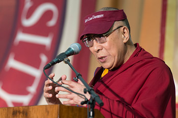 His Holiness the Dalai Lama speaking at the morning panel discussion on "Business, Ethics and Compassion" at Santa Clara University in Santa Clara, California on February 24, 2014. Photo/Charles Barry
