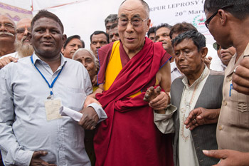 His Holiness the Dalai Lama with residents of the Tahirpur Leprosy Complex in New Delhi, India on March 20, 2014. Photo/Tenzin Choejor/OHHDL