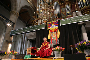 His Holiness the Dalai Lama speaking to members of the Tibetan community living in Nordic countries at the church of Laurenskerk in Rotterdam, Holland on May 10, 2014. Photo/Jeppe Schilder