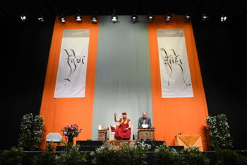 His Holiness the Dalai Lama speaking on "Compassion and Self Awareness" at Fraport Arena in Frankfurt, Germany on May 14, 2014. Photo/Manuel Bauer