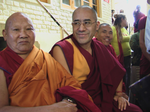 Monks smiling